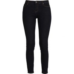 Armani Exchange Jeans Skinny Fit indigo denim. Niebieskie jeansy damskie relaxed fit Armani Exchange, z bawełny. Za 479,00 zł.
