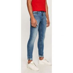 Tommy Hilfiger - Jeansy. Niebieskie jeansy męskie TOMMY HILFIGER, bez wzorów. Za 579,90 zł.