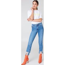 NA-KD Jeansy z rozdarciami - Blue. Niebieskie jeansy damskie z wysokim stanem marki NA-KD. Za 202,95 zł.