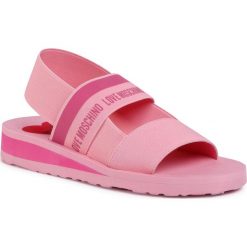 Sandały LOVE MOSCHINO - JA16013G0AJW1600 Rosa. Różowe klapki damskie Love Moschino, bez wzorów, z tworzywa sztucznego, bez obcasa. W wyprzedaży za 229,00 zł.