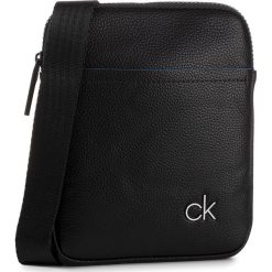 Saszetka CALVIN KLEIN - Ck Direct Mini Flat Crossover K50K504815 BDS. Czarne torby męskie skórzane Calvin Klein, bez wzorów, ze skóry ekologicznej, młodzieżowe. Za 269,00 zł.