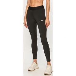 Reebok - Legginsy. Czarne spodnie damskie Reebok, s, z nadrukiem, z elastanu. Za 159,90 zł.