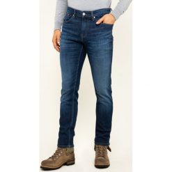 Jeansy Slim Fit Tommy Jeans DM0DM06422. Niebieskie jeansy męskie Tommy Jeans, m, bez wzorów. W wyprzedaży za 299,00 zł.