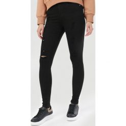 Czarne Spodnie Skinny Xenlenne. Czarne spodnie damskie Born2be, bez wzorów. Za 109,99 zł.