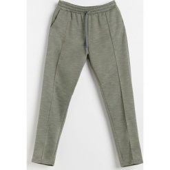 Dzianinowe spodnie - Khaki. Brązowe spodnie damskie Reserved, s, z dzianiny. Za 69,99 zł.