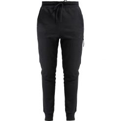 Spodnie dresowe damskie: Nike Sportswear TECH PANT Spodnie treningowe black
