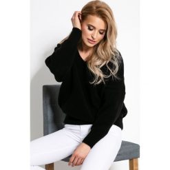 Sweter oversize na wiosnę - czarny, s/m. Czarne swetry damskie e-margeritka.pl, na wiosnę, s, bez wzorów, z wełny, z krótkim rękawem, krótkie, bez kaptura. Za 119,99 zł.