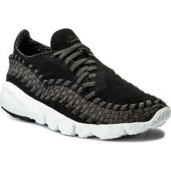 Buty NIKE - Air Footscape Woven Nm 875797 001 Black/Black/Anthracite/White. Czarne półbuty męskie Nike, na co dzień, bez wzorów, ze skóry, bez zapięcia. W wyprzedaży za 429,00 zł.