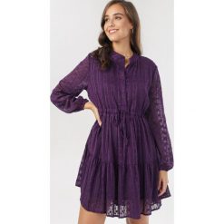 Fioletowa Sukienka Orseis. Fioletowe sukienki damskie Born2be, s, bez wzorów, bez kołnierzyka, bez rękawów, mini. Za 149,99 zł.