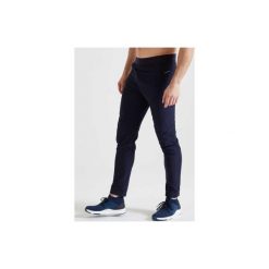 Spodnie dresowe fitness cardio FPA 500 męskie. Niebieskie spodnie męskie DOMYOS, xl, bez wzorów, z elastanu. Za 79,99 zł.