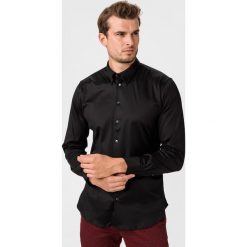 Giorgio Armani Koszula Czarny. Czarne koszule męskie Giorgio Armani, bez wzorów, z bawełny, bez kołnierzyka, z długim rękawem. Za 1611,95 zł.