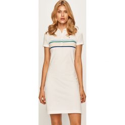 Tommy Hilfiger - Sukienka. Białe sukienki damskie TOMMY HILFIGER, na co dzień, s, bez wzorów, z elastanu, casualowe, bez kołnierzyka, z krótkim rękawem, krótkie, mini, proste. Za 449,90 zł.