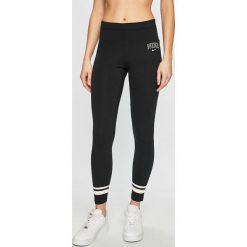 Nike Sportswear - Legginsy. Czarne legginsy damskie marki Nike Sportswear, s, z nadrukiem, z elastanu. Za 119,90 zł.