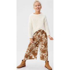 Mango Kids - Spodnie dziecięce Tigre 116-164 cm. Pomarańczowe spodnie dziewczęce Mango Kids, bez wzorów, z wiskozy. Za 99,90 zł.