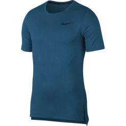 Nike Koszulka Niebieski. Niebieskie podkoszulki męskie Nike, m, bez wzorów, z elastanu, bez kołnierzyka, z krótkim rękawem, krótkie. Za 154,95 zł.