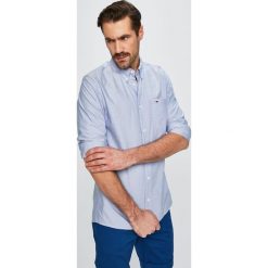 Tommy Jeans - Koszula. Białe koszule męskie Tommy Jeans, xl, bez wzorów, z bawełny, casualowe, button down, z długim rękawem. W wyprzedaży za 199,90 zł.