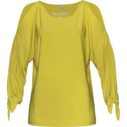 Shirt z wycięciami w rękawach bonprix żółto-zielony. Żółte koszulki damskie marki bonprix, bez wzorów, bez kołnierzyka. Za 59,99 zł.