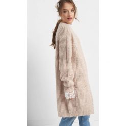 Kardigan oversize. Pomarańczowe kardigany damskie Orsay, s, z poliesteru. Za 119,99 zł.