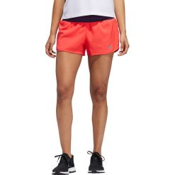 Spodenki adidas Run It Shorts W Fioletowo-Koralowe. Pomarańczowe spodenki sportowe damskie Adidas, bez wzorów, do biegania, climalite (adidas). Za 79,99 zł.