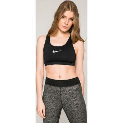 Nike - Biustonosz. Czarne biustonosze sportowe damskie marki Nike, l, z nadrukiem, z elastanu. W wyprzedaży za 99,90 zł.