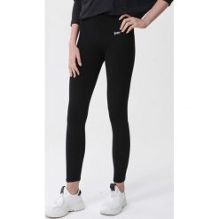 Czarne Legginsy Kennedi. Czarne legginsy sportowe damskie Born2be, s, z aplikacjami, do biegania. Za 49,99 zł.