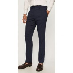 Marciano Guess - Spodnie. Niebieskie spodnie męskie MARCIANO GUESS, z haftami, z elastanu. Za 599,90 zł.