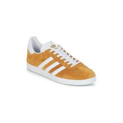 Buty adidas GAZELLE. Żółte trampki męskie Adidas, bez wzorów, bez zapięcia. Za 379,00 zł.