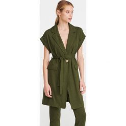 Dzianinowa kamizelka - Khaki. Brązowe kamizelki damskie Reserved, s, bez wzorów, z dzianiny, bez kaptura. Za 119,99 zł.