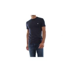 T-shirty z krótkim rękawem Guess M94I24 J1300 CORE TEE. Niebieskie t-shirty męskie Guess, s, z aplikacjami, bez kołnierzyka, krótkie. Za 106,12 zł.