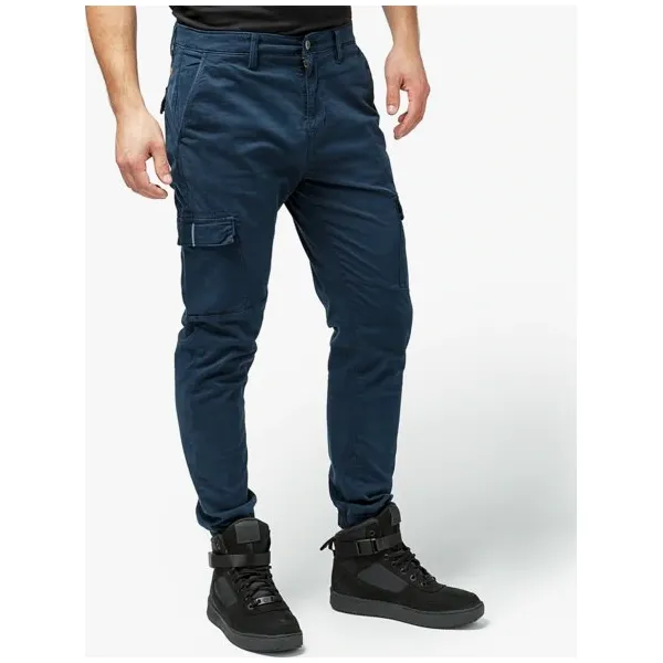 Timberland Spodnie Tapered Hybrid Cargo , granatowy, rozmiar 38/32. Niebieskie spodnie męskie Timberland, m, bez wzorów, z elastanu, klasyczne. W wyprzedaży za 255,99 zł.