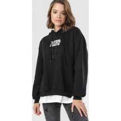 Czarna Bluza Corealora. Czarne bluzy damskie Born2be, s, bez wzorów, bez rękawów, z kapturem. Za 89,99 zł.