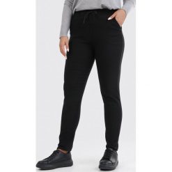 Czarne Spodnie Eshirienne. Czarne spodnie damskie Born2be, xl, bez wzorów, z tkaniny. Za 69,99 zł.