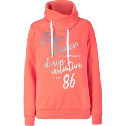 Bluza z brokatowym nadrukiem bonprix łososiowy pomarańczowy z nadrukiem. Pomarańczowe bluzy damskie bonprix, z nadrukiem, bez rękawów, bez kaptura. Za 89,99 zł.