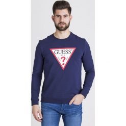 BLUZA JARED GUESS. Niebieskie bluzy męskie Guess, s, z nadrukiem, z elastanu, z okrągłym kołnierzem, bez rękawów, bez kaptura. Za 223,30 zł.