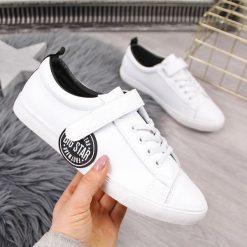 Tenisówki damskie z ekoskóry białe Big Star FF274479. Białe trampki i tenisówki damskie BIG STAR, bez wzorów, bez zapięcia. Za 119,99 zł.