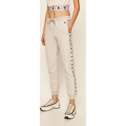 Champion - Spodnie x CHIARA FERRAGNI. Czarne spodnie damskie Champion, s, z bawełny. W wyprzedaży za 699,90 zł.