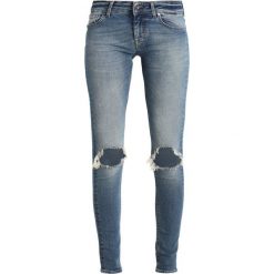 Tiger of Sweden Jeans SLIGHT Jeans Skinny Fit blue denim. Niebieskie jeansy damskie relaxed fit marki Tiger of Sweden Jeans, z bawełny. W wyprzedaży za 367,95 zł.
