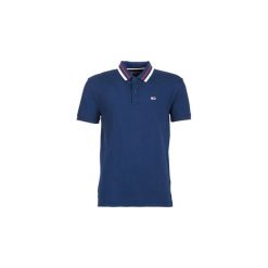 Koszulki polo z krótkim rękawem Tommy Jeans TJM TOMMY CLASSICS POLO. Niebieskie koszulki męskie Tommy Jeans, s, bez wzorów, z jeansu, z krótkim rękawem. Za 247,20 zł.