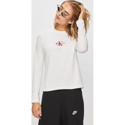 Calvin Klein Jeans - Longsleeve. Szare bluzki damskie Calvin Klein Jeans, s, z aplikacjami, z bawełny, z okrągłym kołnierzem. Za 259,90 zł.