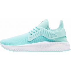 Puma TSUGI CAGE Tenisówki i Trampki island paradies. Niebieskie tenisówki męskie Puma, z materiału. Za 459,00 zł.