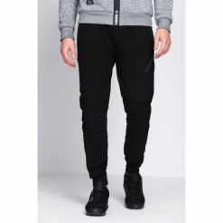 Czarne Spodnie Dresowe Tie the Best. Czarne spodnie dresowe męskie marki Born2be, m, z nadrukiem, z dresówki, z kapturem. Za 44,99 zł.