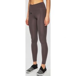 Under Armour - Legginsy. Fioletowe spodnie damskie Under Armour, s, z elastanu. W wyprzedaży za 249,90 zł.