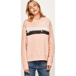 Champion - Bluza. Różowe bluzy damskie Champion, s, bez wzorów, z bawełny, bez rękawów, bez kaptura. W wyprzedaży za 239,90 zł.