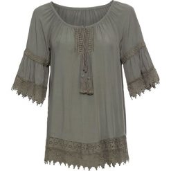 Tunika z koronką i falbanami bonprix khaki. Zielone tuniki damskie bonprix, w koronkowe wzory, z koronki, bez kołnierzyka, bez rękawów. Za 64,99 zł.