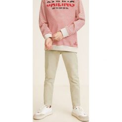 Mango Kids - Spodnie dziecięce Piccolo4 104-164 cm. Szare spodnie chłopięce marki Mango Kids, bez wzorów, z elastanu, casualowe. Za 69,90 zł.