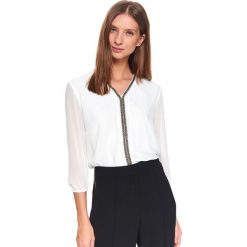 Bluzka z ozdobną aplikacją. Białe bluzki damskie Top Secret, z aplikacjami, z tkaniny, eleganckie, z dekoltem w serek, bez rękawów. Za 119,99 zł.