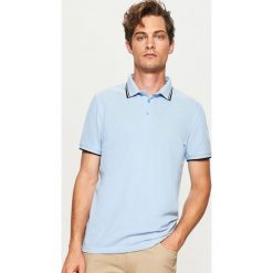 Koszulka polo - Niebieski. Niebieskie koszulki polo marki Reserved, l. W wyprzedaży za 49,99 zł.