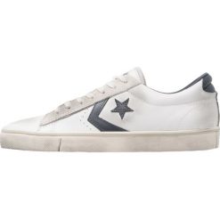 Converse Tenisówki i Trampki white/navy. Szare tenisówki damskie marki Converse, z gumy. W wyprzedaży za 356,15 zł.