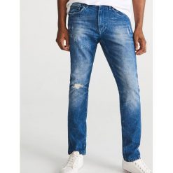 Jeansy slim z bawełny organicznej - Niebieski. Niebieskie jeansy męskie Reserved, m, bez wzorów. Za 129,99 zł.