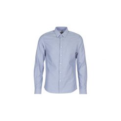 Koszule z długim rękawem Calvin Klein Jeans CHAMBRAY SLIM NON STRETCH L/S. Niebieskie koszule męskie Calvin Klein Jeans, s, bez wzorów, z jeansu, bez kołnierzyka, z długim rękawem. Za 359,00 zł.